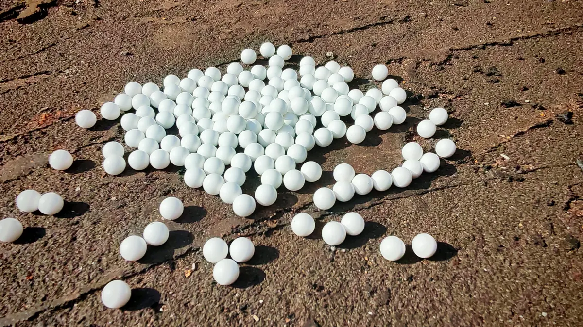 A pile of biodegradable airsoft BBs